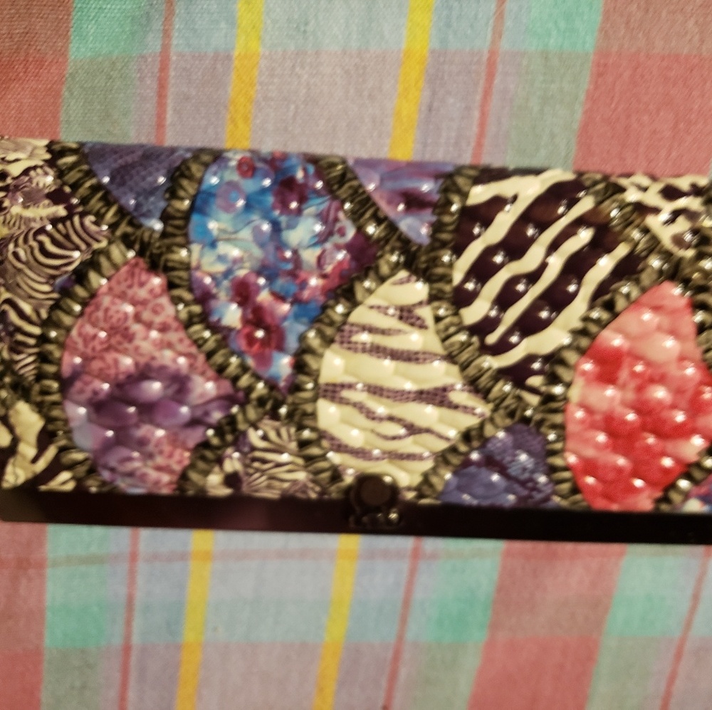 Never used multicolored clutch.